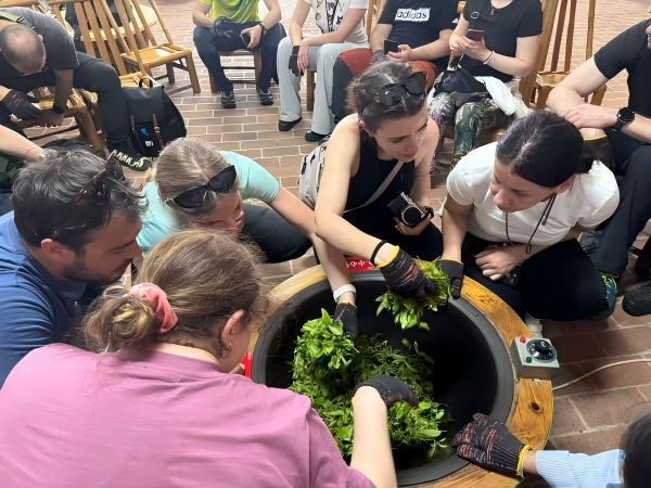 Visitors Enjoy Tea Making Experience