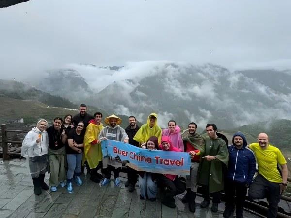 Visitors Enjoy Guilin Longji Rice Terraces Tour