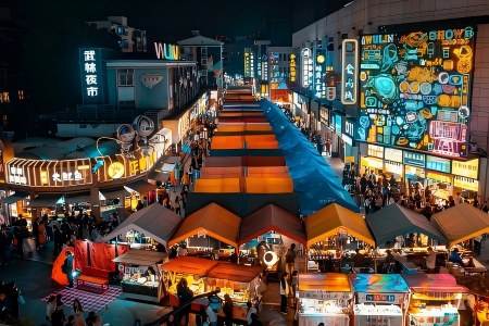 Night View of Wulin Night Market Hangzhou View of Wulin Night Market with colorful food stalls and glowing neon signs in Hangzhou