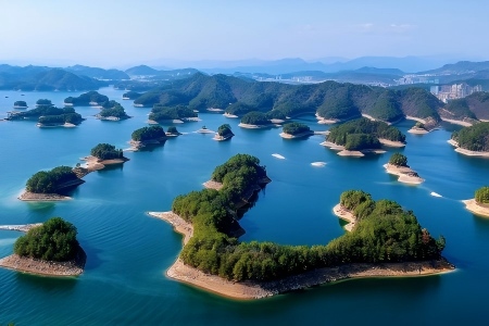 Aerial View of Thousands of Green Islands at Qiandao Lake Countless forest-covered small islands scattered in clear blue water of Qiandao Lake
