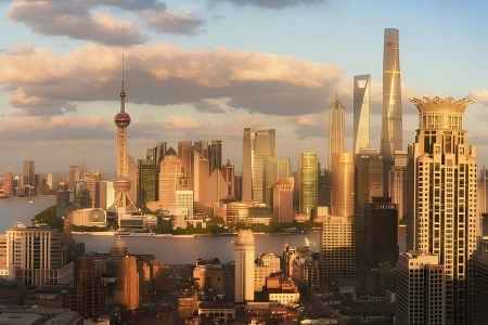 Aerial view of Shanghai skyline, Bund buildings, Oriental Pearl Tower and Lujiazui skyscrapers by Huangpu River