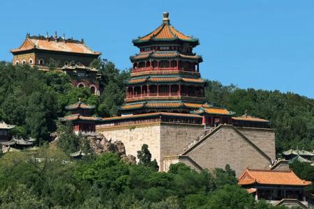 The Fragrant Pavilion at Beijing Summer Palace surrounded by green hills and traditional Chinese architecture