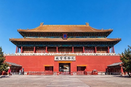 Forbidden City main gate in Beijing under a clear blue sky