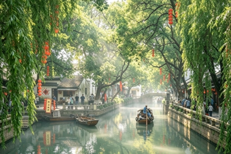 Tongli Ancient Town, peaceful water town scene with canal, rowing boat, willow trees and traditional Chinese houses, Suzhou