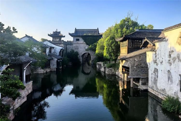 Yanguan Ancient Town Yanguan Ancient Town in Hangzhou showing ancient street buildings and riverside scenery