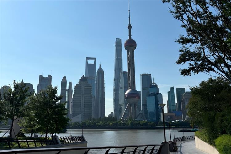 The North Bund in Shanghai showing riverside scenic area with panoramic view of Huangpu River and Pudong skyscraper skyline