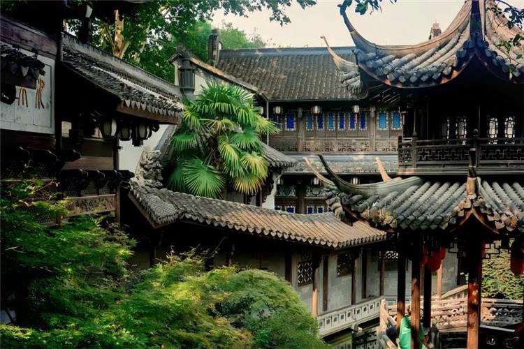 Former Residence of Hu Xueyan in Hangzhou showing luxurious late Qing mansion with exquisite Jiangnan courtyard, pavilions, ponds and mixed Chinese-Western architecture
