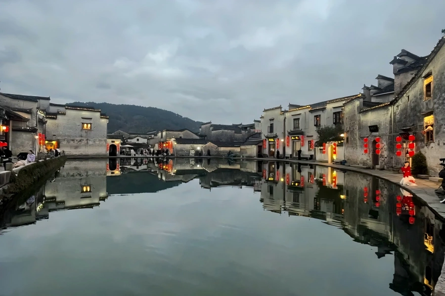 Huangshan Hongcun Ancient Village Hongcun Ancient Village in Huangshan showing world-famous Hui-style ox-shaped ancient village with Moon Marsh, South Lake, mirrored white-walled black-tile houses, ancient courtyards and ink-wash rural scenery hailed as
