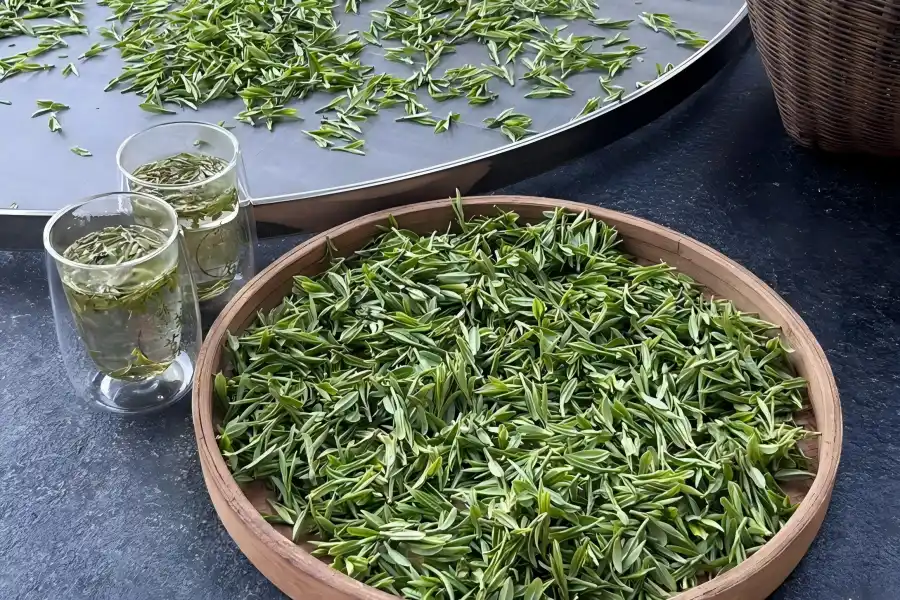 Meijiawu Tea Village Meijiawu in Hangzhou showing visitors tasting fresh Longjing tea amid green tea plantations