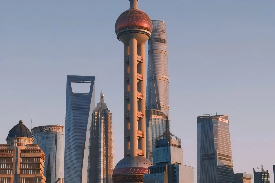 Shanghai Landmark Oriental Pearl Tower Oriental Pearl Tower in Shanghai featuring distinctive spherical towers standing by Huangpu River amid Lujiazui skyscrapers