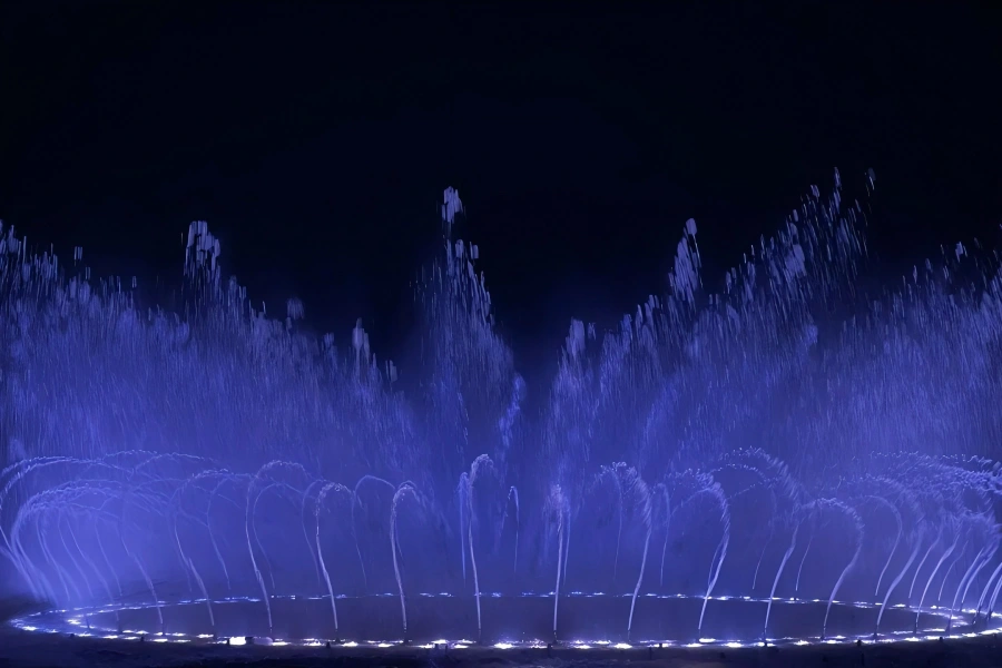 West Lake Musical Fountain in Hangzhou showing brilliant water dance with colorful light effects at night