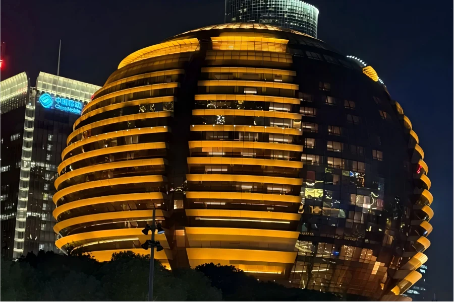 Qianjiang New City Outlets in Hangzhou showing modern shopping plaza with brand retail buildings