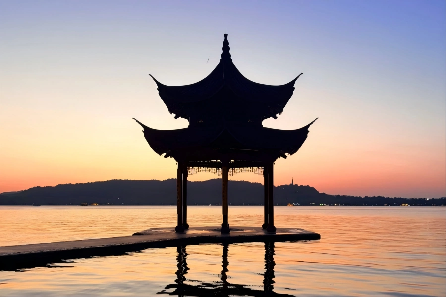 Juxian Pavilion at West Lake in Hangzhou showing ancient waterside pavilion with lake view