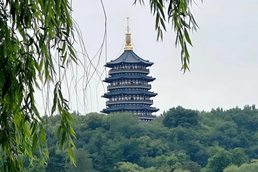 Leifeng Pagoda at West Lake Leifeng Pagoda in Hangzhou showing golden ancient pagoda overlooking West Lake under sunset glow