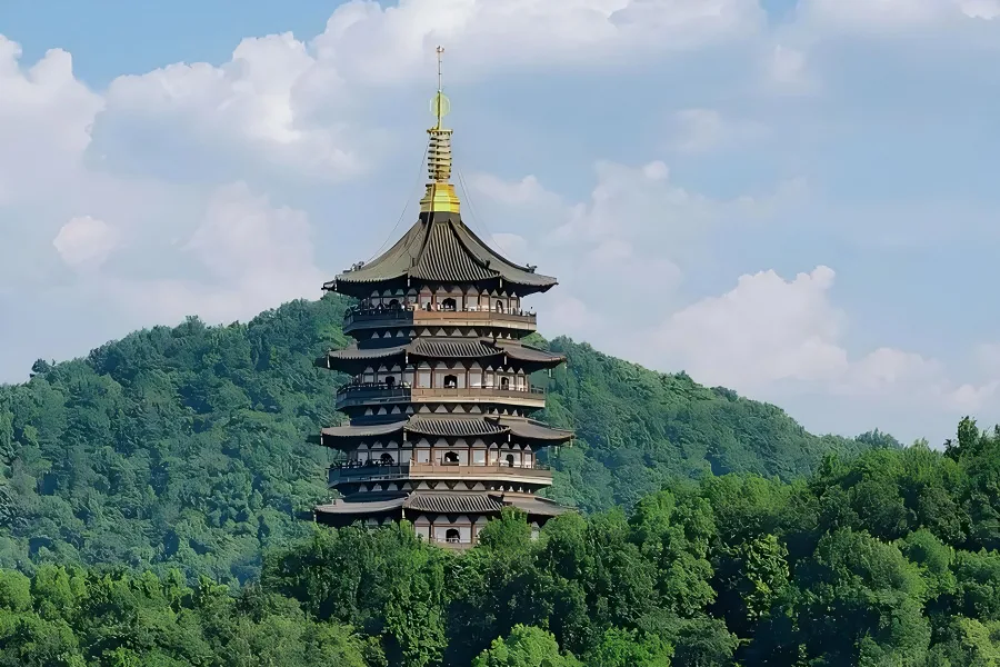 Leifeng Pagoda by West Lake Leifeng Pagoda in Hangzhou showing ancient pagoda overlooking West Lake with lake and mountain scenery
