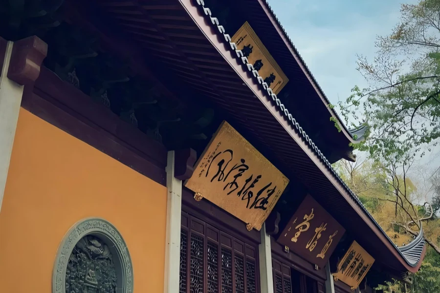 Hangzhou Lingyin Temple Scenic Area Lingyin Temple in Hangzhou showcasing time-honored Jiangnan Buddhist architecture surrounded by lush green mountain scenery