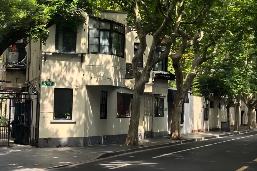 Quiet boulevard with century-old plane trees, elegant garden houses and heritage architectures of former French Concession