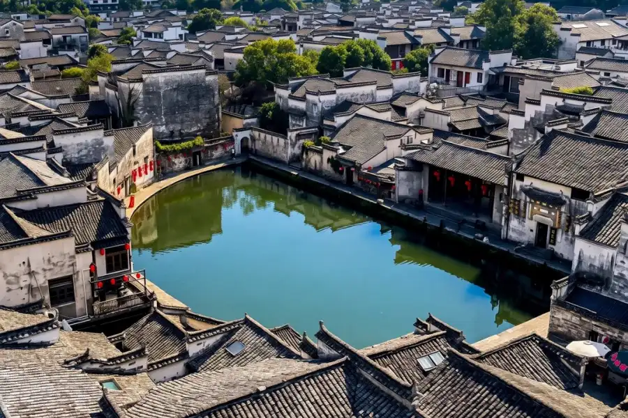 UNESCO ancient Huizhou village, white walls and black tiles reflected in Moon Pond, known as village in Chinese paintings