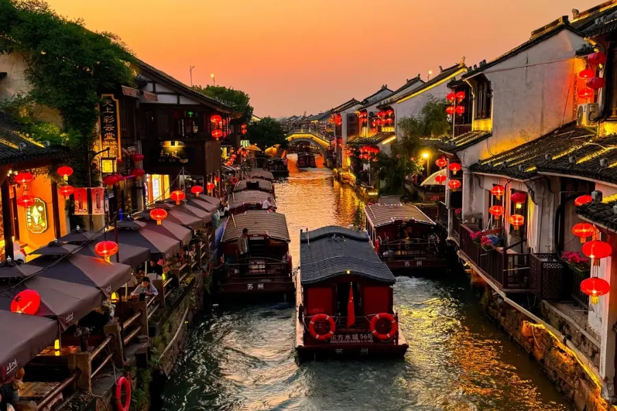 Ancient canal street in Suzhou, old waterfront houses, stone arch bridges and traditional Jiangnan scenery