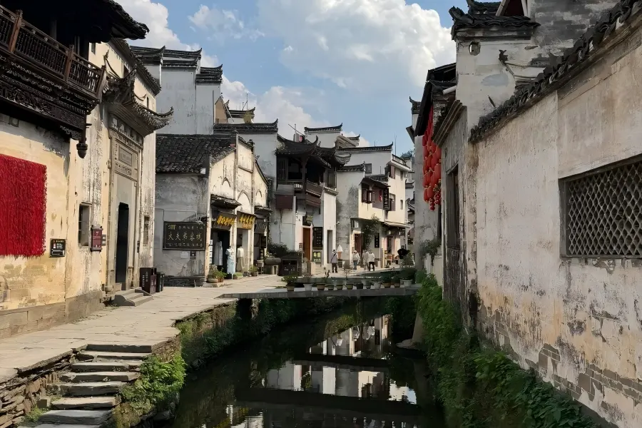 Likeng Ancient Village in Wuyuan showing white?wall?black?tile old buildings scattered along winding village streams