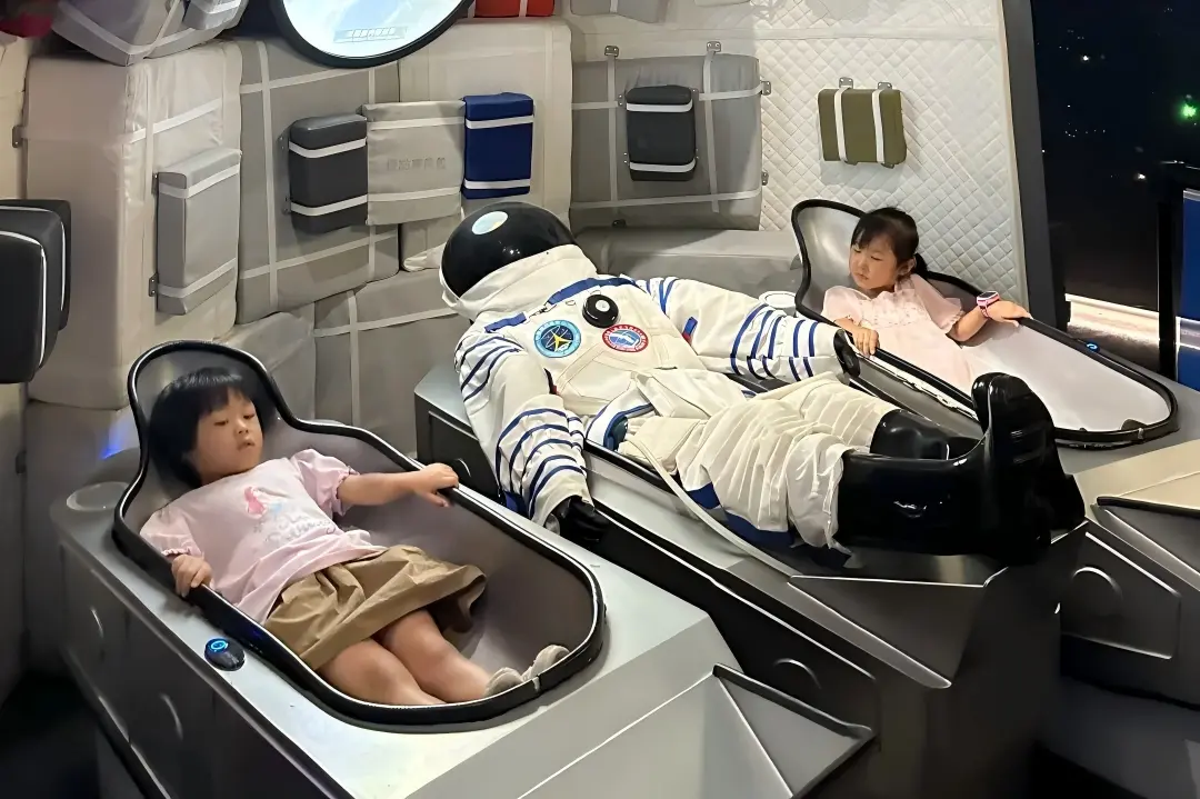 Space Cabin Experience at Shenzhen Science and Technology Museum Kids experience space capsule simulation at Shenzhen Science and Technology Museum