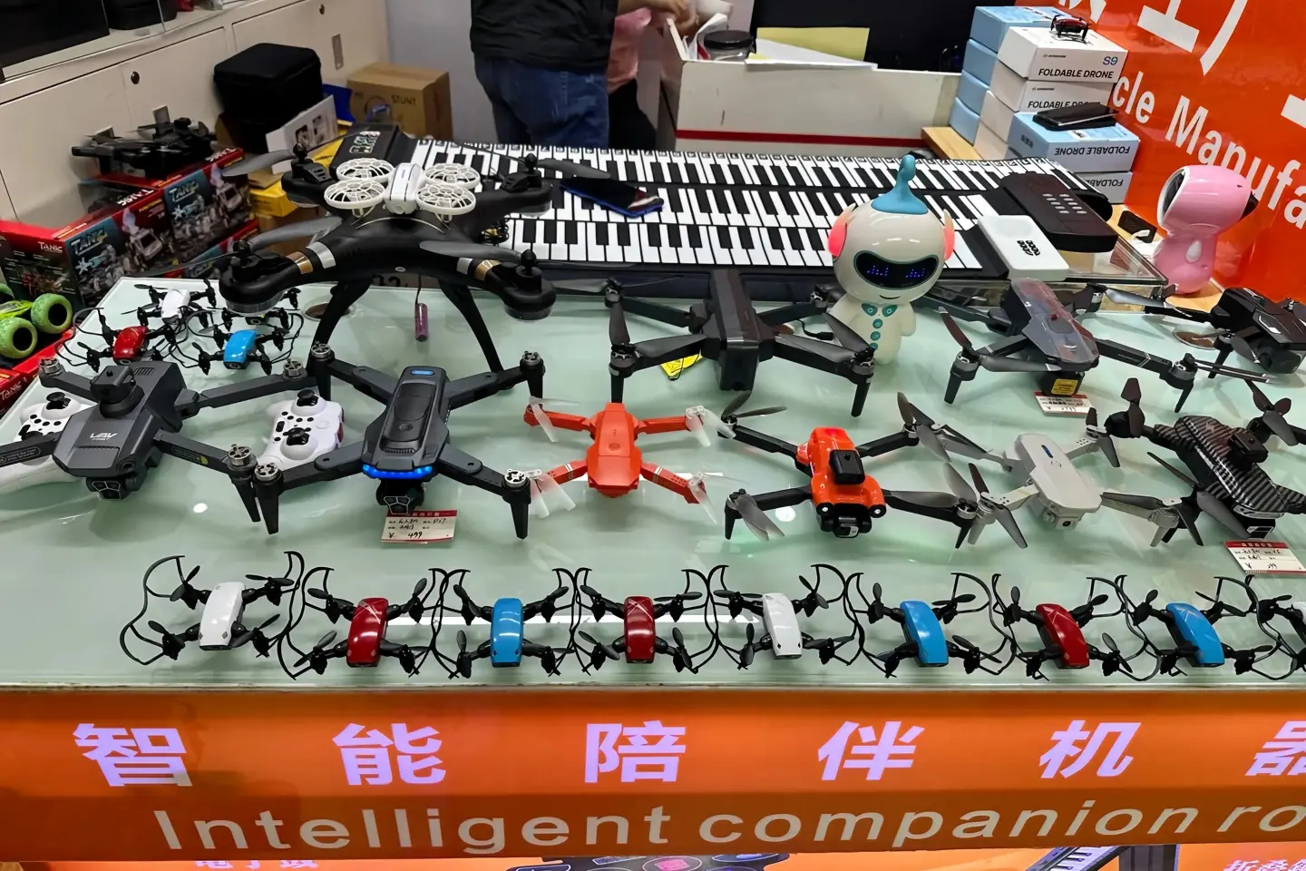 Drones & Smart Gadgets in Huaqiang North Shenzhen Various consumer drones and intelligent robots displayed at Huaqiang North market