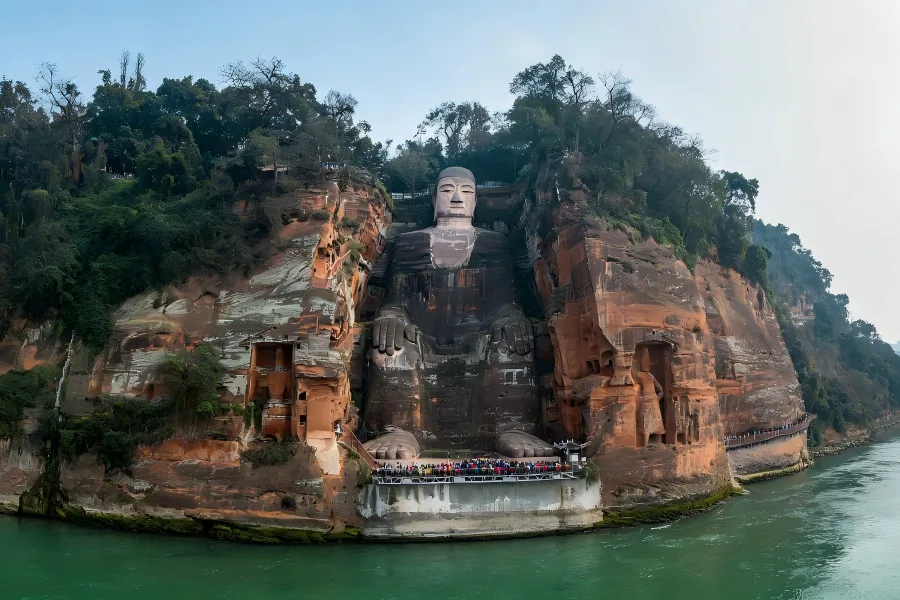 Giant stone Buddha overlooking river at Leshan scenic site
