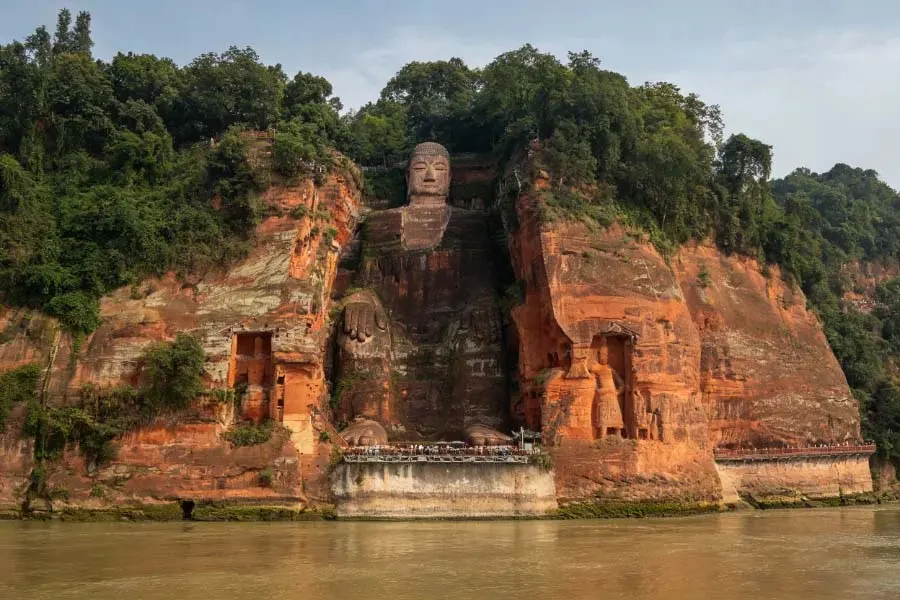 Leshan Giant Buddha in Leshan showing grand cliff?carved Buddha beside river and green hills