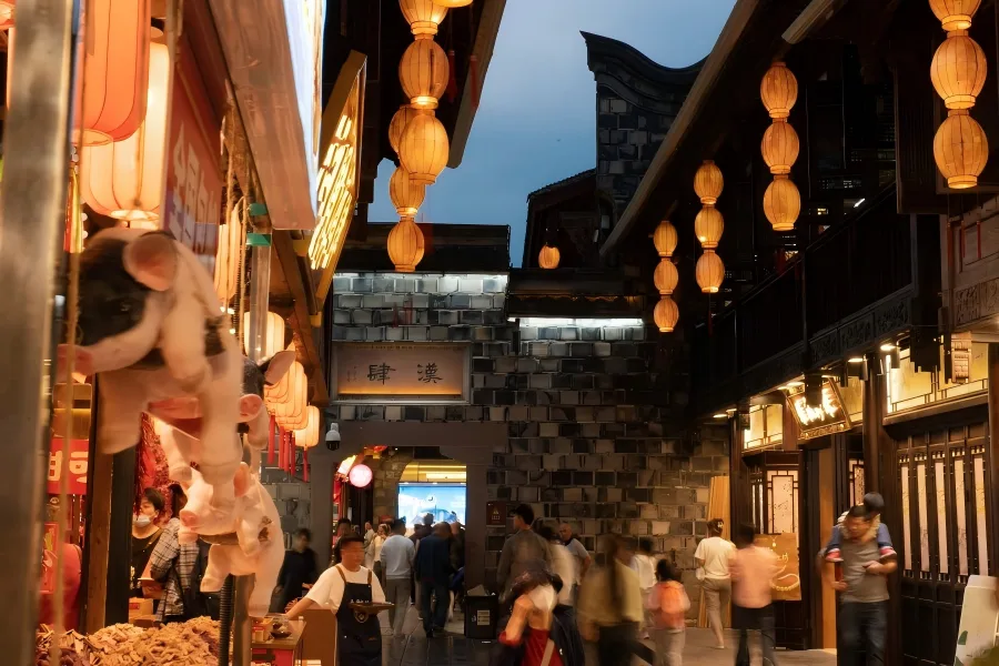 Jinli Ancient Street Night Lantern View Jinli Ancient Street in Chengdu showcasing lively pedestrian street decorated with bright red Chinese lanterns at night
