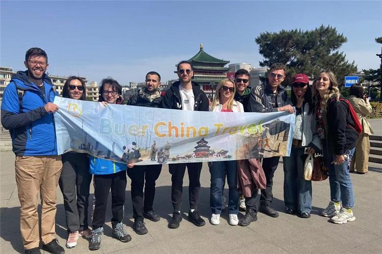 Buer China Travel Group in Xian Tour group banner photo at Xian Bell Tower