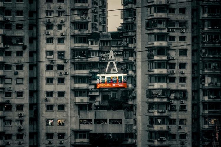 City cable car flying over Chongqing residential blocks