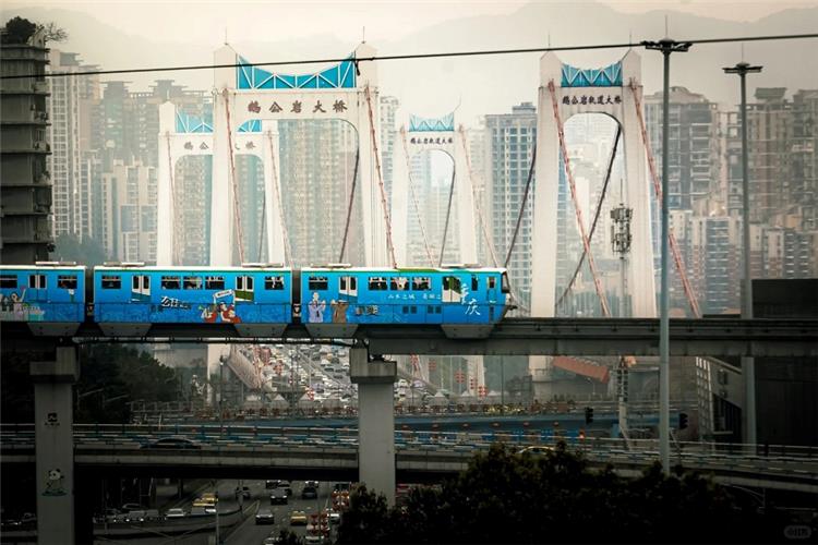 Chongqing light rail train on city suspension bridge