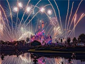 Night view of Enchanted Storybook Castle with gorgeous fireworks reflection on lake at Shanghai Disneyland