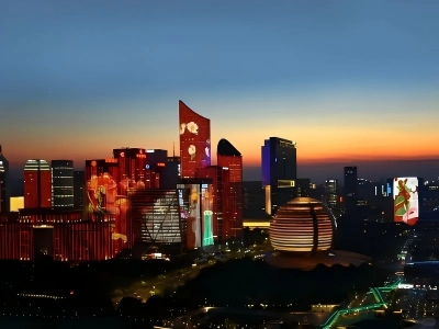 Illuminated skyscrapers and spherical theater at Qianjiang New Town light show
