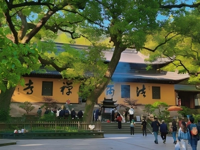 Fayu Temple on Putuo Mountain, yellow temple walls, old green trees and visiting pilgrims