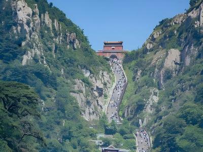 Zhongtian Gate on Mount Tai surrounded by cliffs and green mountains in Tai'an, Shandong, China