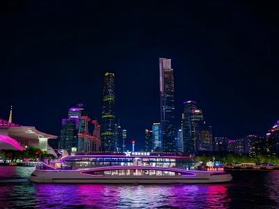 Guangzhou neon-lit sightseeing boats sail on the Pearl River