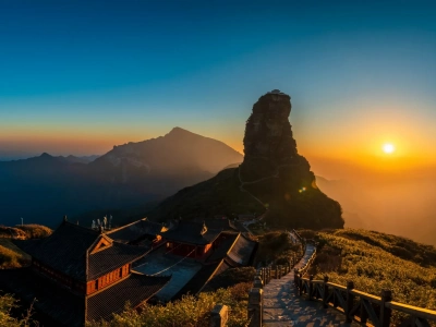 Sunrise over Fanjing Mountain, ancient temple and iconic rock peak, Guizhou