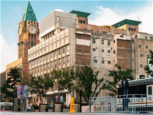City view of landmark clock tower on Wangfujing Street Beijing