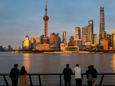 Daytime view of Oriental Pearl Tower, Shanghai Tower and skyscrapers across Huangpu River, iconic scenery seen from Shanghai Bund waterfront