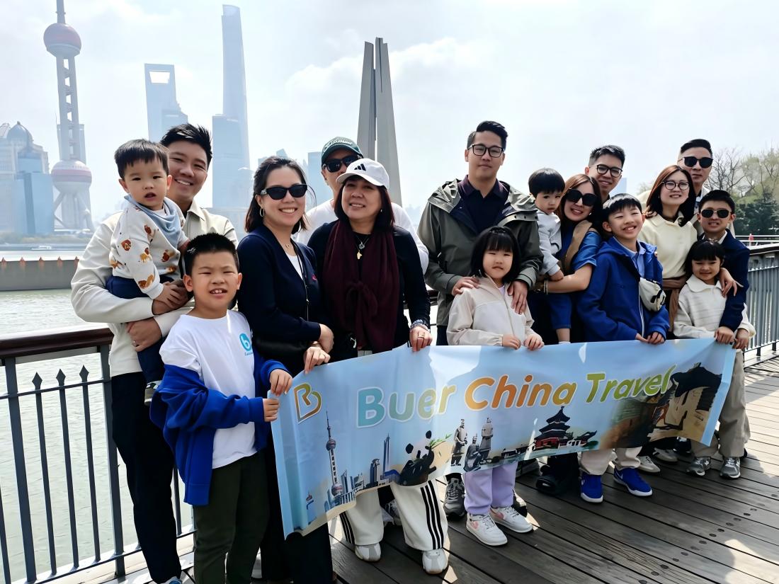 Tourists sightseeing Shanghai riverside