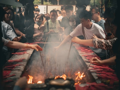 Visitors burning incense at Lingyin Temple Hangzhou