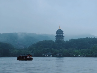Rainy Day Scenery of Leifeng Pagoda and West Lake Cruise Rainy Day Scenery of Leifeng Pagoda and West Lake Cruise