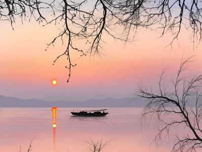 Soft Pink Sunrise over West Lake with Solitary Boat Soft Pink Sunrise over West Lake with Solitary Boat