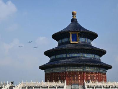 Airplanes and the Temple of Heaven beneath glazed tiles