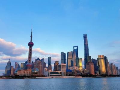 Shanghai skyline with Oriental Pearl Tower and skyscrapers along Huangpu River