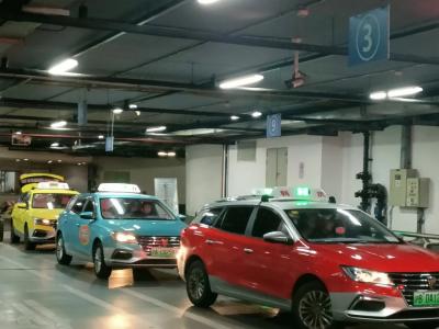 Colorful taxis in the underground parking lot of Shanghai Hongqiao Railway Station