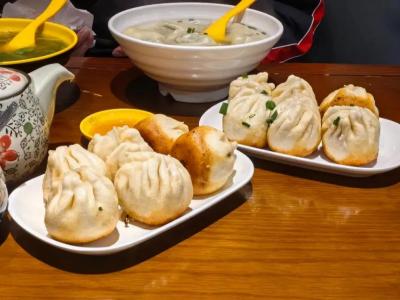 Shanghai shengjian mantou pan-fried soup dumplings with traditional Chinese food