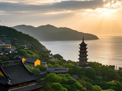Putuo Mountain ancient pagoda and temple overlooking the sea at sunset