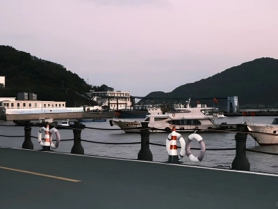 Putuo Mountain ferry dock at dusk, yachts and coastal scenery Putuo Mountain ferry dock at dusk, yachts and coastal scenery